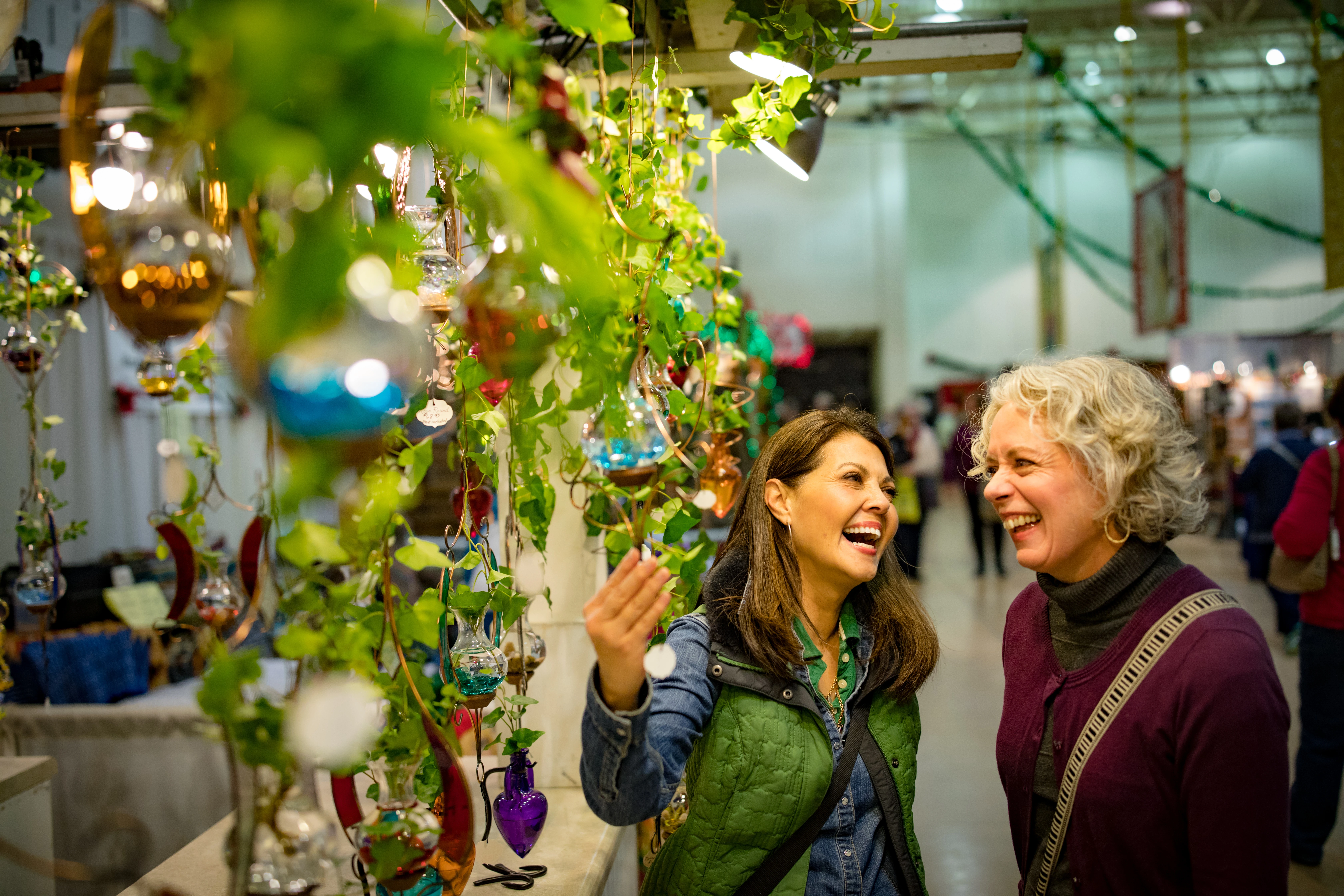 Woman Looking at Hanging Planters at La Crosse Holiday Fair 03 Woman Looking at Hanging Planters at La Crosse Holiday Fair 03