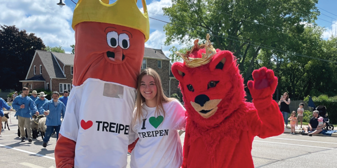 Parade guest meets the Treipen King and the Luxembourg Red Lion at Luxembourg Fest Parade
