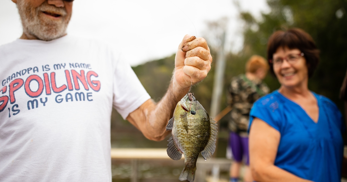 https://www.travelwisconsin.com/uploads/events/61/610bc6fa-08c5-47bc-9706-af5e0c410770-072-family-fishing-at-wyalusing-state-park-in-bagley.jpg?width=1200&height=630&mode=crop&scale=both&quality=100
