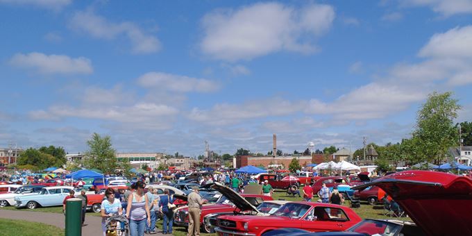 Crowd looking at the vehicles on display at the Badgerland Classics &amp; Customs Car Show &amp; Swap Meet